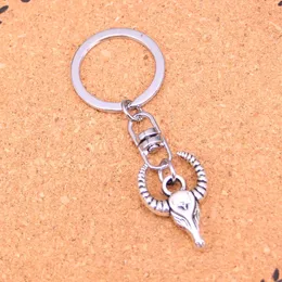 Fashion Keychain 29*20mm bull ox head Pendants DIY Jewelry Car Key Chain Ring Holder Souvenir For Gift