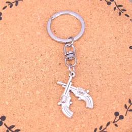Fashion Keychain 31*23mm crossed pistols revolvers western Pendants DIY Jewelry Car Key Chain Ring Holder Souvenir For Gift