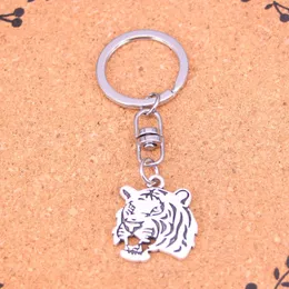 Fashion Keychain 27 * 24mm Roaring Tiger Head Pendants DIY smycken bil nyckelkedja ringhållare souvenir för gåva