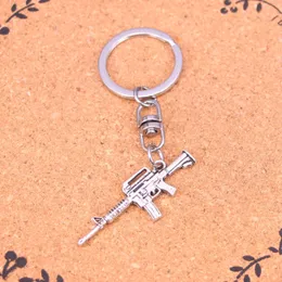 Mode Schlüsselbund 45*16mm maschinengewehr sturmgewehr Anhänger DIY Schmuck Auto Schlüssel Kette Ring Halter Souvenir Für Geschenk