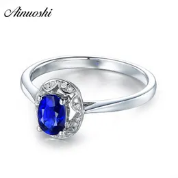 Ainuoshi 1.25 Carat Oval Corte Azul Sona Bridal Halo Anéis 925 Sterling Silver 4 Pontões Hollow Mulheres Casamento Anniversary Anel Presente Y200106