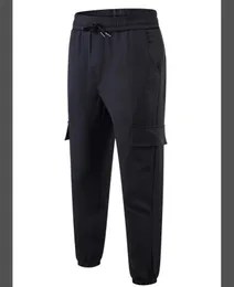 貨物ズボン服ランニングスタイルの男長いズボンのトレンディなヒップホップスポーツファッションの下でフィットネスを保つParkour BBB 2209