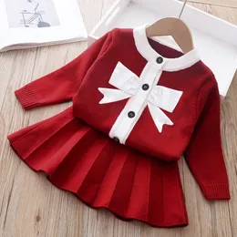 女の子冬服セットカジュアルな子供長袖ちょう結び編みセーターシャツ+スカート2個のPCSスーツ2-6歳の女子服X1019