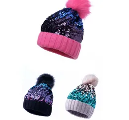 Skull Sequin knit hatt med faux päls pom-pom mode hårig boll öronmuffar huvudbonad mode tidvatten keps vinter stickad hatt