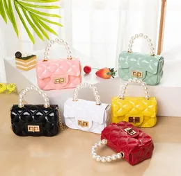 Crianças pequenas bolsas pérolas bolsa de bebê de moda de moda de diamante bolsa de geléia de um ombro de um ombro mini-chave de cor de cor de cor