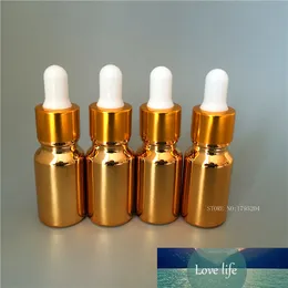 25st / lot UV Mini Golden Glass Dropper Oil Essential Flaskor i Refillerbar Flaska Parfum Container Makeup Tool
