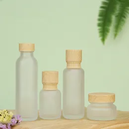 Frosted Glass Jar Lotion Cream Bottles Round Cosmetic Jars Hand Face Lotion Pump Bottle with wood grain cap Bottles HHA3475