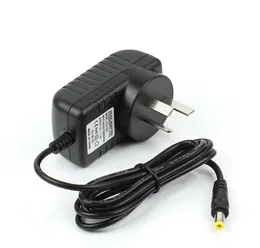 50PCS AC 100V-240V Converter Adapter DC 12V 2A / 24V 1A / 5V 3A / 15V 2A Strömförsörjning Laddare UK Plug Ny + GRATIS Express