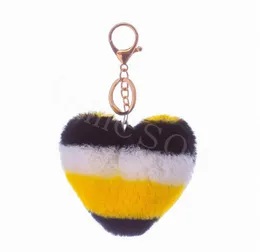 Fashion Splicing Heart Ball Pom Pom Keechain Fluffy Furx Furx Pelliccia Pompom Pompom Women Borse Charms Trinket Christmas Keyring DB310