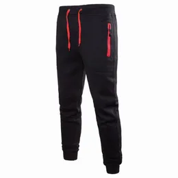 Mäns byxor Casual Drawstring Waist Sweatpants med fickor Fasta färgbyxor för män Manlig Sportkläder Sport Calça Jogger