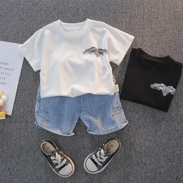 Coola barn pojkar nya sommar kläder outfit toddler girls mode wing print t-shirt + denim shorts set barn casual kläder g1023