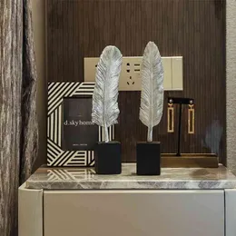 北欧スタイルクリエイティブフェザー本棚の飾りシンプルでモダンなホームリビングルームの装飾工芸品ホームインテリアデスクアクセサリー210811