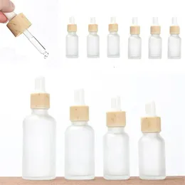Bottiglie contagocce Vuote Bottiglia di vetro smerigliato riutilizzabile Contenitore di olio essenziale Contenitori di profumo liquido cosmetico con coperchi di bambù imitati