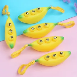 Kreativitet Söt Eye Squeezing Banan Pinching Music Toy Pressure Losenting Enhet Doudou Nyckel Kedja Hänge