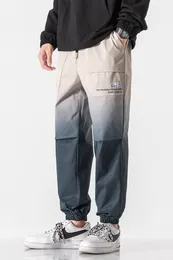 Jesienne spodnie cargo mężczyźni moda osobowość gradientowy kolor modny hip hop spodnie Contrast kolorowe dno jogging mężczyźni