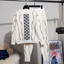 秋冬トラックスーツ高品質ニットスーツスパンコール刺繍セーター+ロングパンツ女性衣装ホワイトブラックニットトラックスーツ2個セット