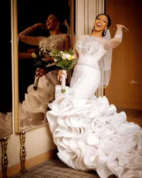 2022 Lyx Arabiska Mermaid Bröllopsklänningar Sheer Långärmade Lace Crystal Beaded Ruffles Tiered Bridal Bröllopsklänningar Elegant Robe de Marie Plus Storlek Coret Tillbaka