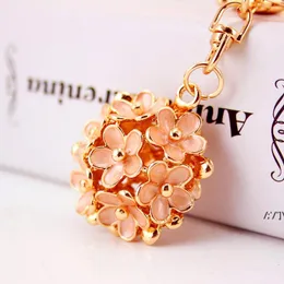 Keychain Small daisy flower key chain women bag accessories metal pendant girl five leaf flower key ring creative gift RRE12144