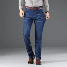 Primavera autunno nuovi jeans da uomo classici blu neri slim fit pantaloni in denim elasticizzati in cotone da lavoro pantaloni di marca maschili