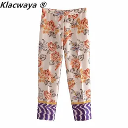 Klacwaya mulheres 2021 bolsos laterais de moda calças de impressão floral vintage cintura alta splicing hem elástica calças de tornozelo feminino mujer q0801