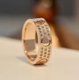 V anel de banda de charme de material dourado com três linhas de diamante tamanho amplo para presente de joias de casamento feminino tem caixa normal selo PS3125A tem logotipo