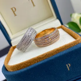 Pierścienie ślubne Posiada seria Pierścień Piage Rose wyjątkowo 18 -karatowe złoto srebrne srebrne luksusowe biżuterię obrotowe wykwintne designerskie pierścionki diamenty pary prezenty