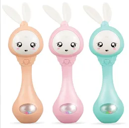 Muzyka Baby Flashing Teether grzechotki Zabawki Rabbit Hand Dzwonki Mobilny smoczek Niemowląt Weep Łza Noworodek Wczesne Zabawki Edukacyjne 0-12m