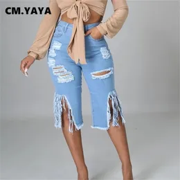 CM.YAYA Mujeres Jeans Hole Ripped Tassle Cintura baja Flare Elástico Longitud de la rodilla Pantalones de mezclilla Sexy Moda High Street Pantalones 210730