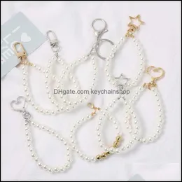 Keychains 패션 액세서리 진주 랜디드 손목 스트랩 자동차 키/전화 USB 홀더 진주 구슬 키 체인 홀더 ID 카드 배지 DIY HANGI