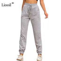 Liooil 2021 높은 허리 헐렁한 스웨트 팬츠 섹시 바지 포켓이있는 Streetwear Drawstring 캐주얼 느슨한 조깅 여성 땀 팬츠 Q0801