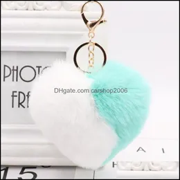 سلاسل المفاتيح الموضة Aessories عصرية مزدوجة القلب القلب للنساء بوم فو فرو مفتاح سلسلة Pompom Car Keyring حقيبة قلادة Aessories1 Drop Delive