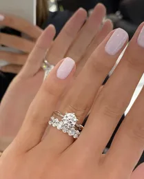 古典的な6つの爪925スターリングシルバーの結婚指輪2ctラウンドシミュレートされたダイヤモンドの婚約カクテルリングの女性ジュエリーのための指のセット