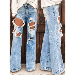 Seksowne damskie spodnie daniowe Ripped otwory wysokiej talii dorywczo cienkie spodnie boot cięcie mody luźne kobiece chłopak jeans 211129