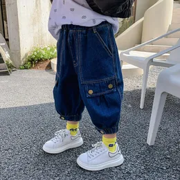 Jeans Boy's Buckle Buckle Весна и летние детские корейские моды повседневные брюки удобные 9 точечные шорты оптом в розницу