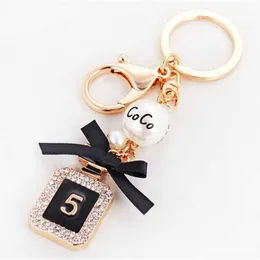 Brand Perfume Bottle Keychain Luxury Key Chain Fashion Key Ring Holder Keyrings Women Souvenirs Car Bag Charm Pendant G1019