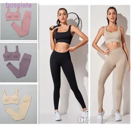 Kvinnor Fitness Tracksuits Yoga kostym solid färg sömlös tråd samlad bh tight sport hög elastisk persika hip lyft sportkläder för höst