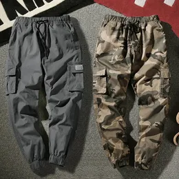 Designer Hiphop Joggers Cargo Pants Homem HAREM Camuflagem Multi-bolso Homem Man Sorto de Sweatwear Casual Casual Plus Tamanho