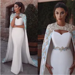 Wspaniałe suknie wieczorowe z wrap Syrenka balu koraliki Appliqued Eleganckie Dubai Arabskie cekiny formalne Party Wear Robe de Mariée