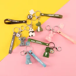 Party Favorit PVC Geometrisk tecknad Keychain Rolig Dinosaur Kvinnor Smycken Söt Charm Bag Keys Chain Car Key Ring Tillbehör