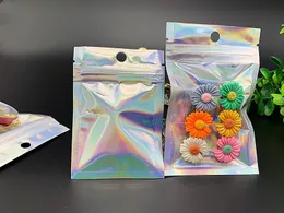 小さなサイズのセルフシールバッグホログラムホログラフィックのクリアZipの再消耗式プラスチック小売ロック包装袋ジッパーマイラーバッグパッケーポーチ