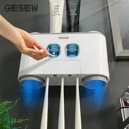 GESEW Magnetic Toothbrush Holder Bathroom Automatic Toothpaste Dispenser Wall Paste Toothpaste squeezer Bathroom Accessories Set 210322