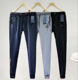 男性のズボン夏のファッションスポーツのズボンのスウェットパンツ緩い柔軟な快適なしわ抵抗性の通気性の高い弾性ズボンアジアのサイズM-XXL