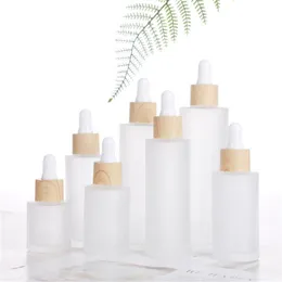 Frostat eterisk oljeglasflaska Kosmetisk platt axel droppflaskor behållare med imiterad bambu keps 20 ml 30 ml 60 ml 100 ml