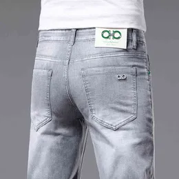 e jeans di tendenza primavera estate da uomo slim fit elastico coreano pantaloni lunghi piede piccolo marca