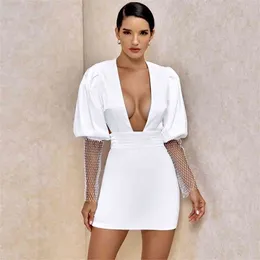 Ocstrade Beyaz Bodycon Elbise Kadınlar Uzun Kollu Bodycon Elbise Yeni Moda Yaz Seksi Derin V Boyun Backless Club Parti Elbise 210325