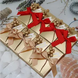 50 pcs europeu bowknot Caixas de doces favorecem o presente doce dourado mão caixas embalagens saco de embalagem caixas de bebê festa de casamento decoração 211216