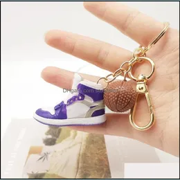 Nyckelringar Fashion Aessory Fahmi Jewelry 2021 Högkvalitativ grossistbasket Basket Keychain och Hain Holder Brand Design Key Ring Door Drop De