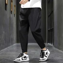 Hybskr cor sólida homens harem calças japonês streetwear homem casual calças soltas moda corredores masculino calças calças 3xl 211013