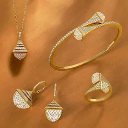 Godki berömda varumärke 4PCs vattendropp smycken uppsättningar för kvinnor bröllopsfest cubic zircon high end craft dubai brud smycken set 210720