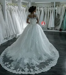 2021ファッションドバイエレガントな長袖A-Line Wedding Dresses Sheer Crew Neck Laceアップリケ